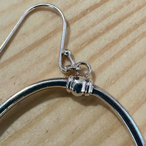Elegant Silver Hoop Earrings - Picture 3 of 4